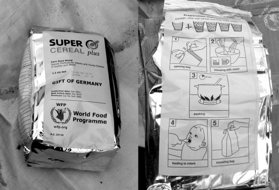 ›Gift of Germany‹: Corn Soya Blend for infants and young children, with detailed preparation instructions by the World Food Programme, 2011 (photos: Tom Scott-Smith) Distribution of BP-5 in Yusuf Batil Refugee Camp, Upper Nile State, South Sudan, July 2012 (photo: Tom Scott-Smith)