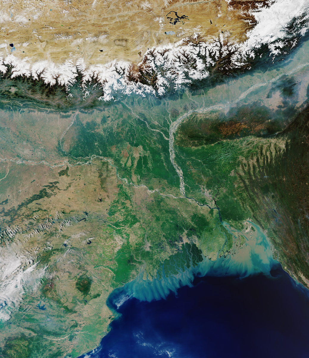 The Copernicus Sentinel-3 mission takes us over the Ganges Delta – the world’s largest river delta. Covering an area of around 100,000 sq km, the Ganges Delta lies in both Bangladesh and the State of West Bengal in India. This image was captured on 31 March 2020 by the European Space Agency (ESA). (Contains modified Copernicus Sentinel data 2020, Wikimedia Commons, https://commons.wikimedia.org/wiki/File:Ganges_Delta_ESA22274217.jpeg, ESA, https://creativecommons.org/licenses/by-sa/3.0/igo/deed.en) The Copernicus Sentinel-3 mission takes us over the Ganges Delta – the world’s largest river delta. Covering an area of around 100,000 sq km, the Ganges Delta lies in both Bangladesh and the State of West Bengal in India. This image was captured on 31 March 2020 by the European Space Agency (ESA). (Contains modified Copernicus Sentinel data 2020, Wikimedia Commons, https://commons.wikimedia.org/wiki/File:Ganges_Delta_ESA22274217.jpeg, ESA, https://creativecommons.org/licenses/by-sa/3.0/igo/deed.en)