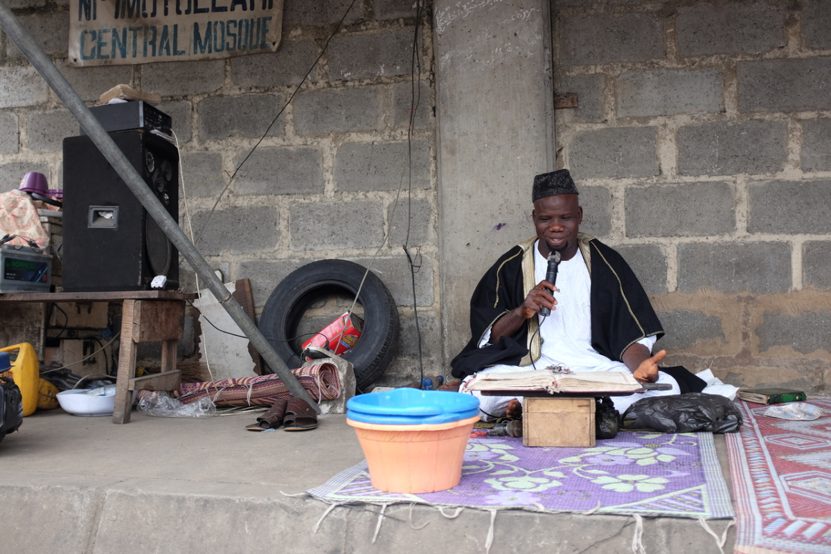 A cleric reciting at Idumota market, Lagos, 2015. Nigerian urban landscapes are saturated with religious sounds emanating from mosques and churches, itinerant preachers, processionals carrying portable bullhorns, and cars with large speakers fixed to the top relaying Christian and Muslim preaching. (photo: Brian Larkin) A cleric reciting at Idumota market, Lagos, 2015. Nigerian urban landscapes are saturated with religious sounds emanating from mosques and churches, itinerant preachers, processionals carrying portable bullhorns, and cars with large speakers fixed to the top relaying Christian and Muslim preaching. (photo: Brian Larkin)